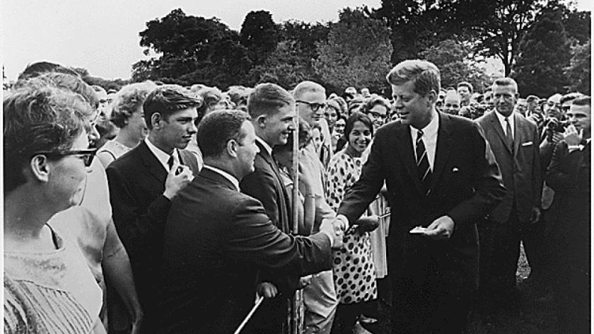 President John F. Kennedy greeting Peace Corps volunteers. (John F. Kennedy Library)