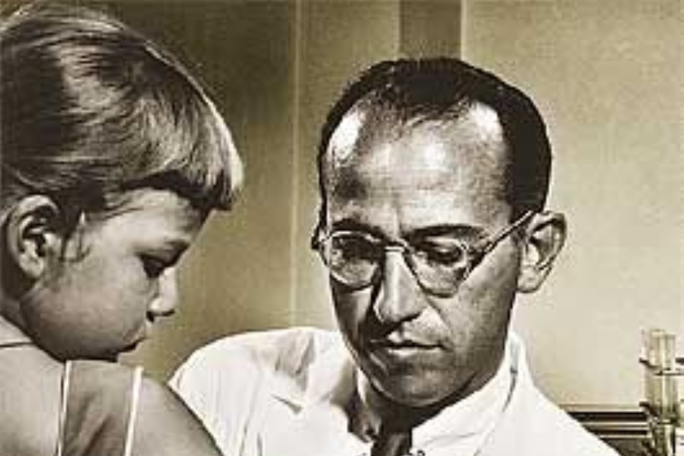 Dr. Jonas Salk vaccinating a child