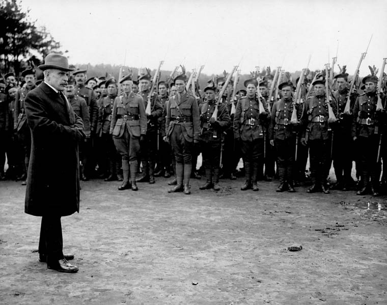 Sir Robert Borden reviews Canadian troops in France.