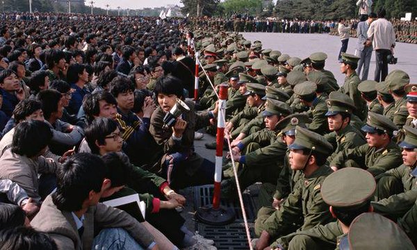 China's gov authorizes troops to begin crackdown of Tiananmen Square protests.