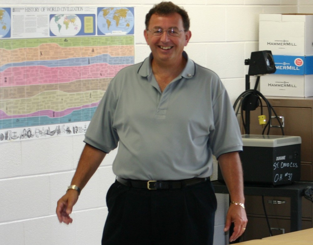 John Fioravanti Stands at the front of his classroom in 2006