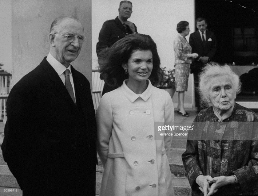 Eamon de Valera (L) standing with Mrs. John F. Kennedy